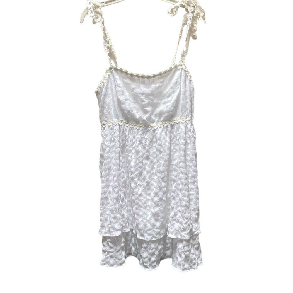 Crystal Doll size L tiered daisy trimmed mini dress.